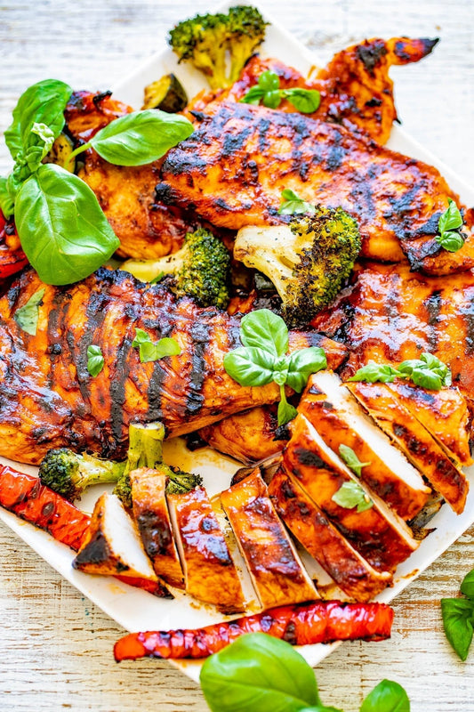 plate of delicious grilled basil chicken sauced with Sweet and Spicy sauce