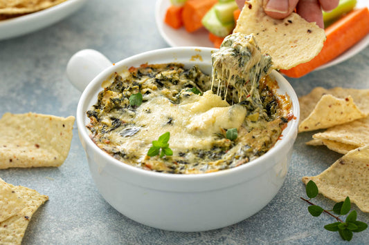 gooey cheesy bowl of Spinach dip